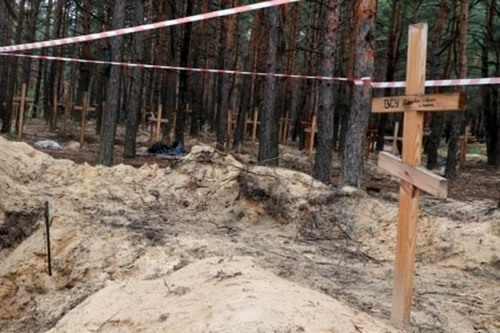 В деокупованому місті на Харківщині виявлено ще два масових поховання людей, убитих війною